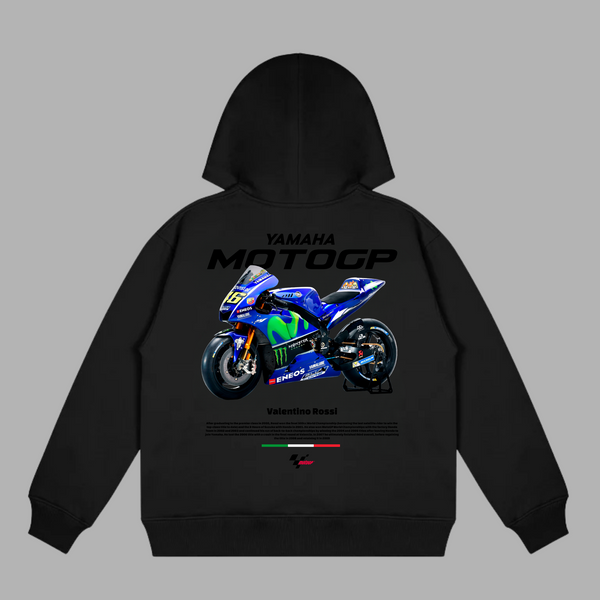 Close-up of Valentino Rossi’s MotoGP hoodie in white with Yamaha graphics and racing sponsor details